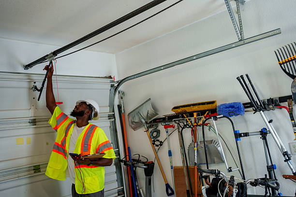 Professional Garage Door Roller Replacement technician working in Roosevelt, NY